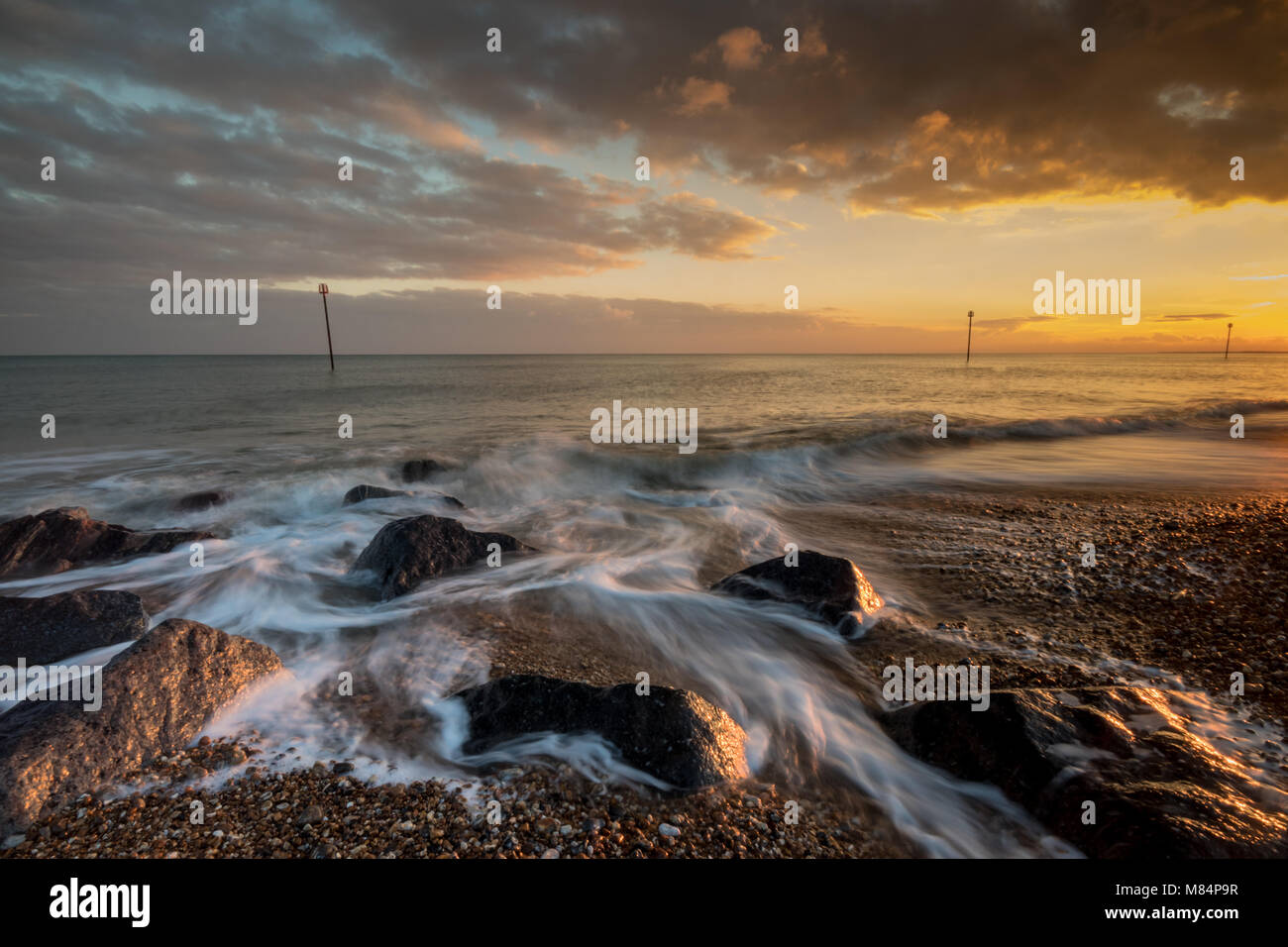 High tide at dusk with a lovely sunset, Bognor Regis promenade, near