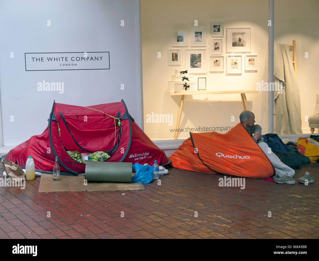 The homeless camping out in a Brighton street Stock Photo
