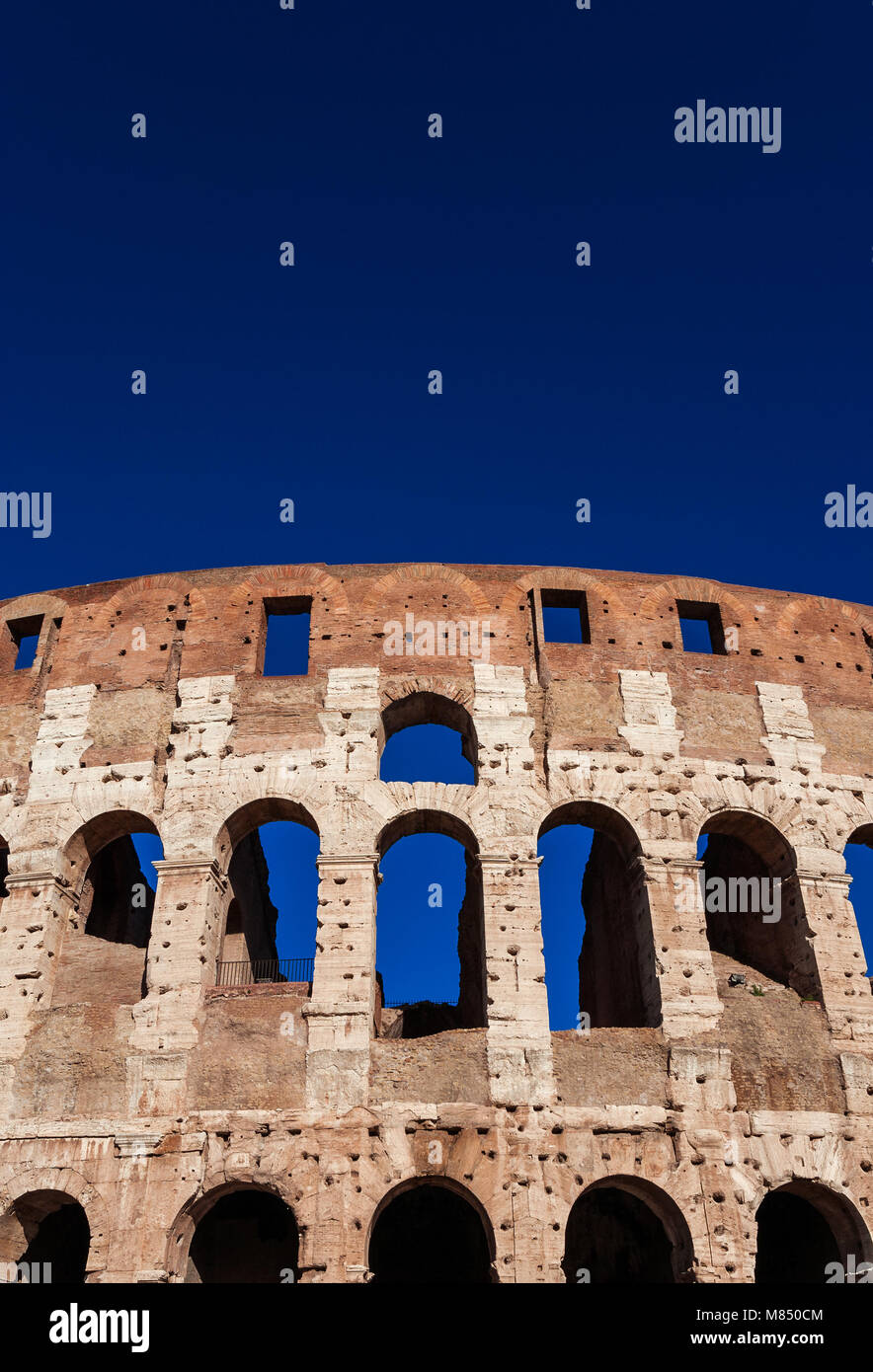 Coliseum inner ring monumental arcades and blue sky in Rome (with copy space above) Stock Photo