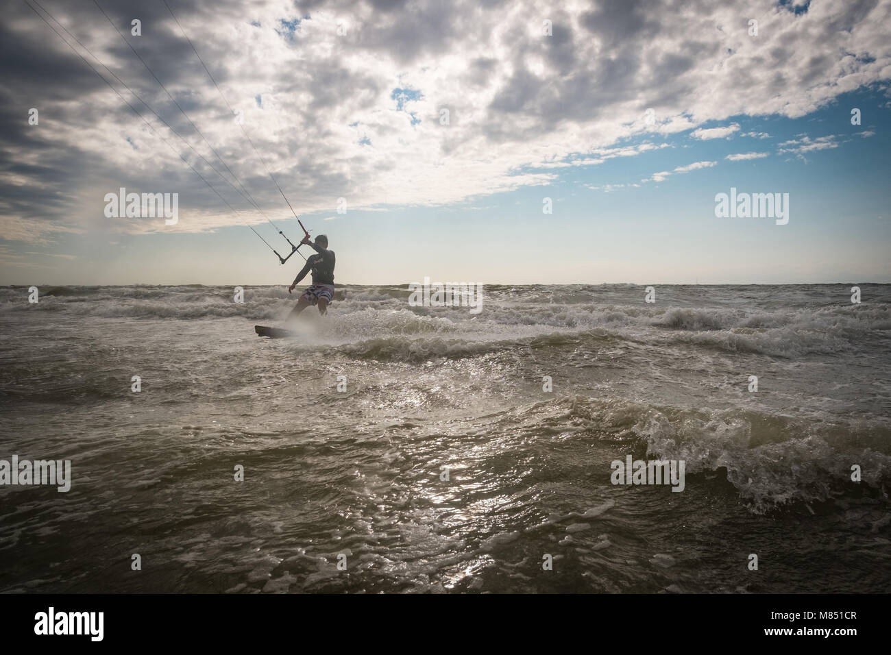 Kiteboarders in action. Stock Photo