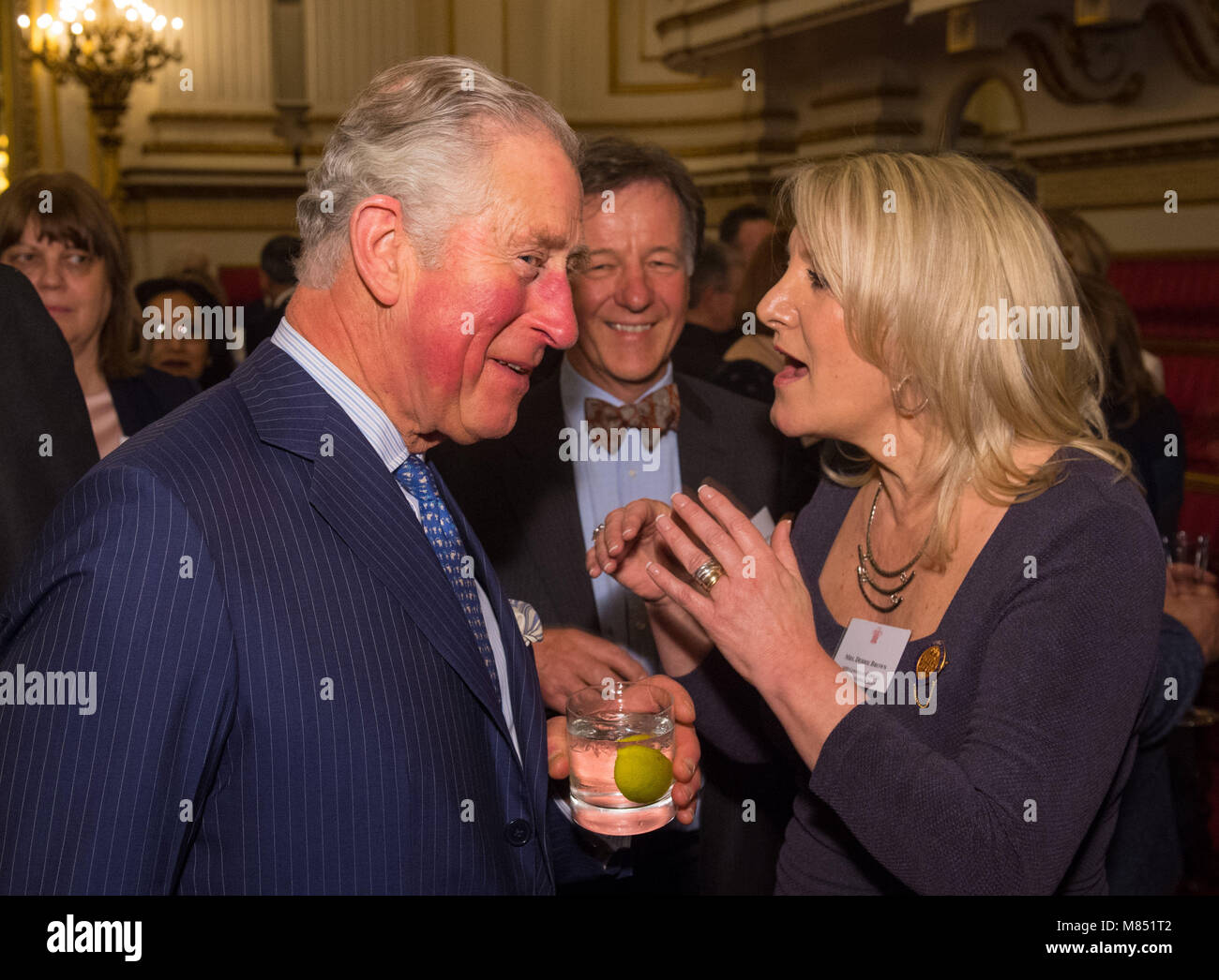 The Prince of Wales meets Debbie Brown of Lewisham Clinical Commissioning Group at a reception to celebrate frontline nursing in the UK at Buckingham Palace in London. Stock Photo