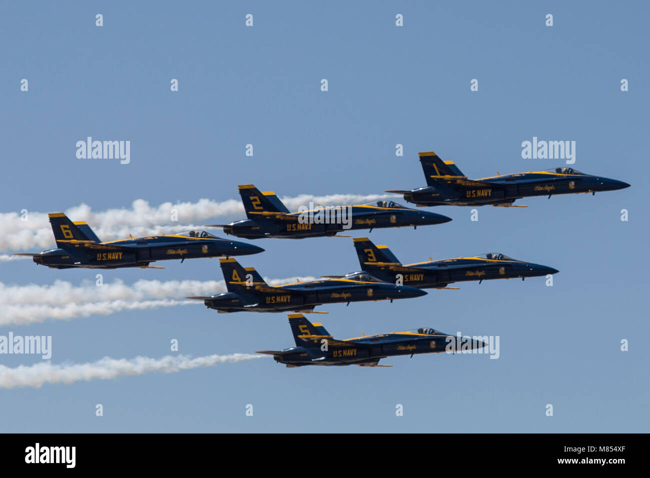 U.S. Navy Blue Angels perform a fly-by over Marine Corps Air Station (MCAS) Yuma, Ariz., March 14, 2018. The Blue Angels are unable to attend this year’s MCAS Yuma Air Show and conducted the fly-by as a thank you to the local community for their invitation. (U.S. Marine Corps photo by Sgt Allison Lotz) Stock Photo