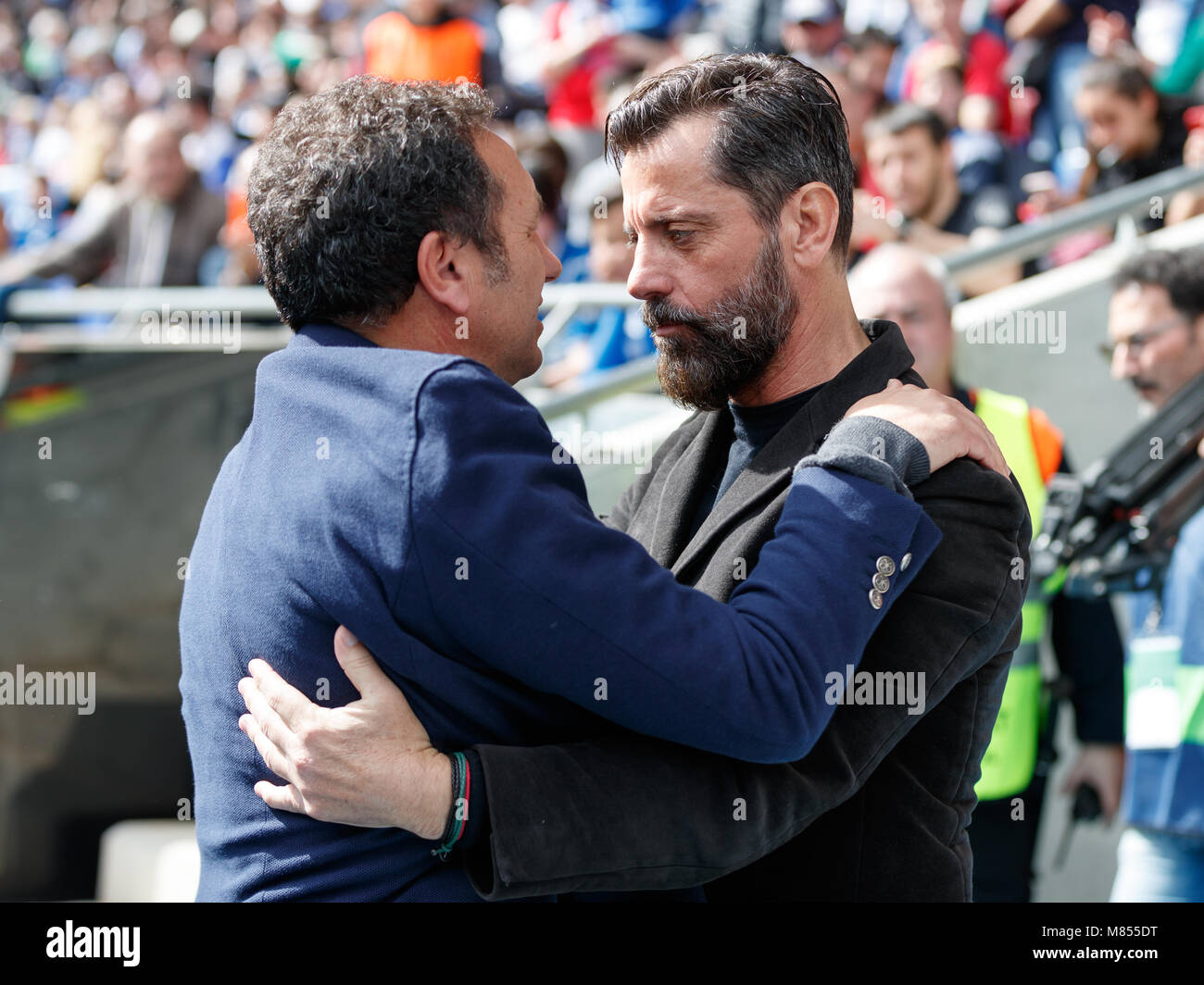 BARCELONA, SPAIN - MARCH 11:  Eusebio Sacristan coach of Real Sociedad with Quique Sanchez Flores coach of RCD Espanyol before the 2017/2018 LaLiga Sa Stock Photo