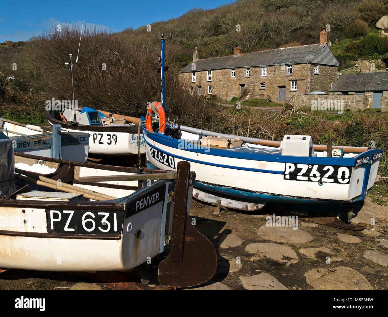 Small Cornish fishing boats on slipway at Penberth Cove, Cornwall, England, UK Stock Photo