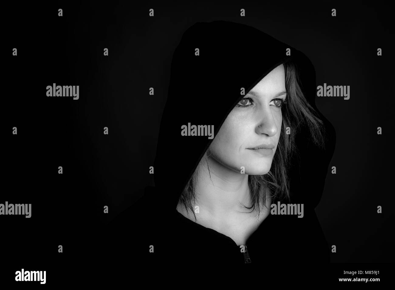 portrait of hooded woman - black and white image Stock Photo - Alamy