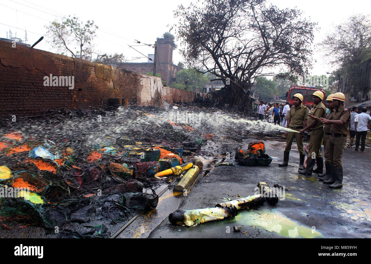Kolkata, India. 18th Sep, 2014. Fire fighter busy to extinguishes fire at Chemical ware house in