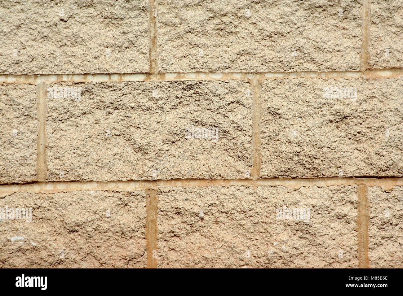 A Stone block wall background texture Stock Photo