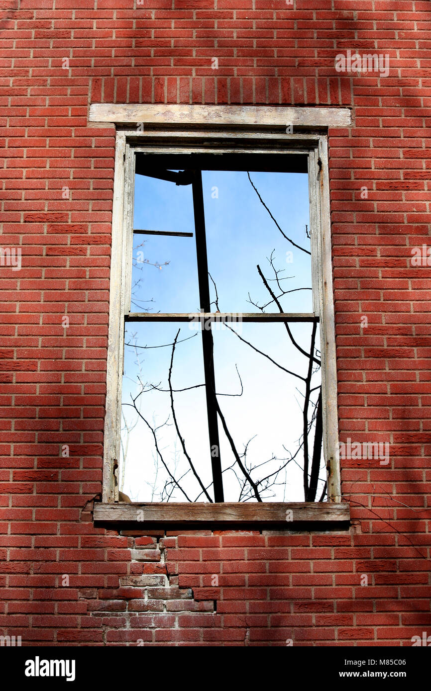 A Old window in a brick wall Stock Photo - Alamy