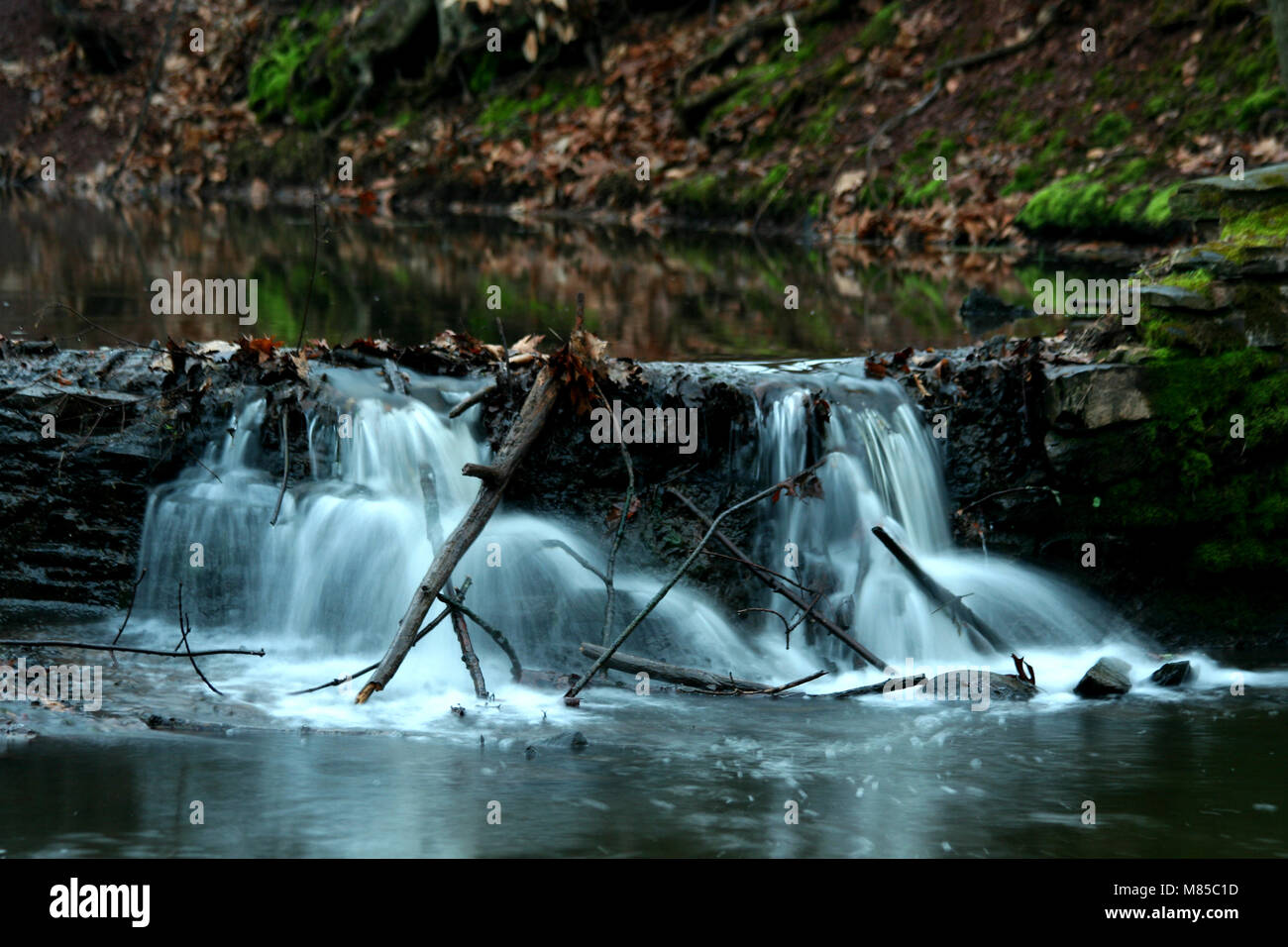 A small flowing waterfall image Stock Photo