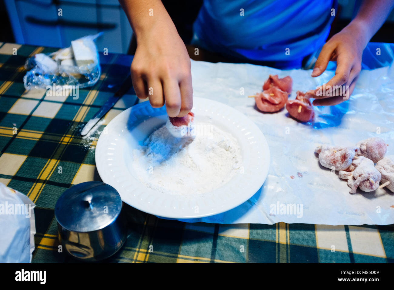 Meat Using Flour hands prepare pieces of meat, put into flour to be cooked,at home Stock ...