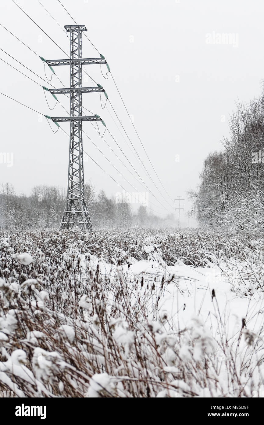 High voltage power lines in winter. Moscow Stock Photo - Alamy