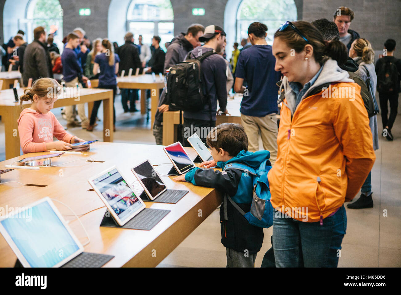 A Customer at an Apple Store Being Helped by an Apple Employee at an Apple  Store Editorial Stock Photo - Image of macbook, ipad: 235899068