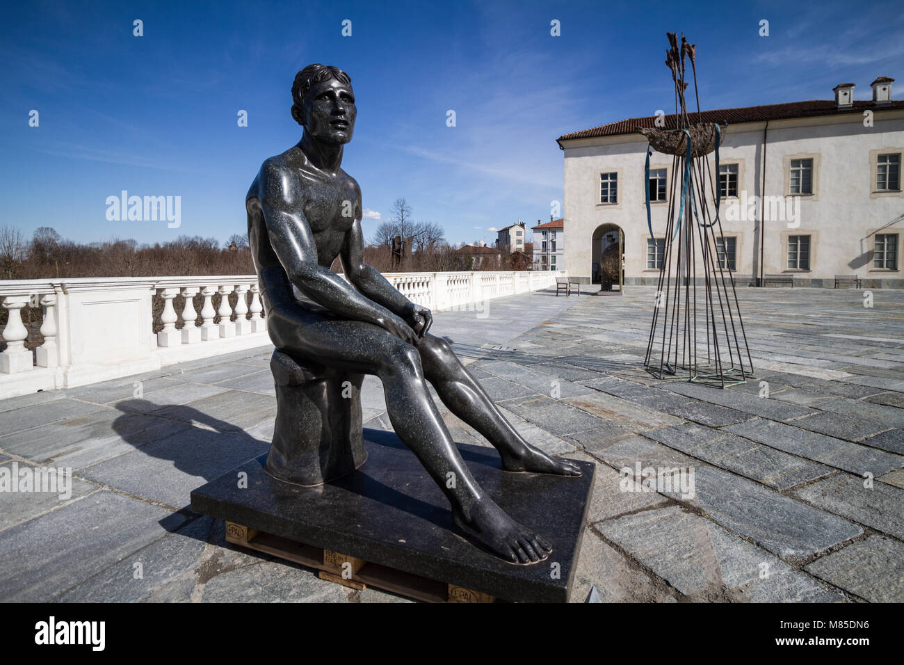 Sculpture about a thoughtful man. Unknown artist. Reggia di Venaria Reale, Italy Stock Photo