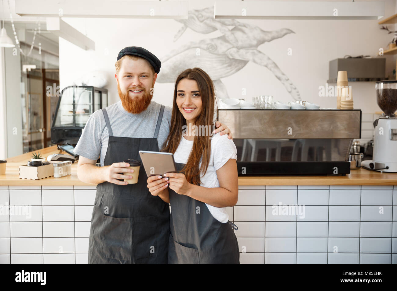 Coffee Business Concept happy young couple business owners of small