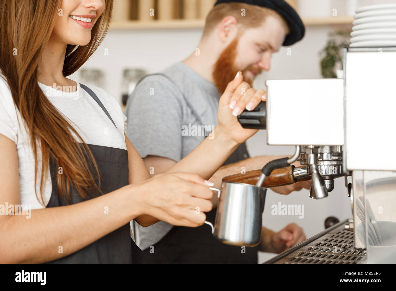 Coffee Business Concept portrait of lady barista in apron preparing