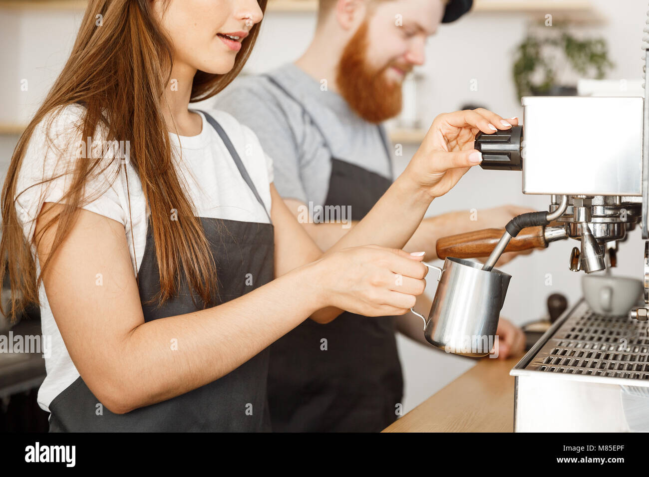 Coffee Business Concept portrait of lady barista in apron preparing
