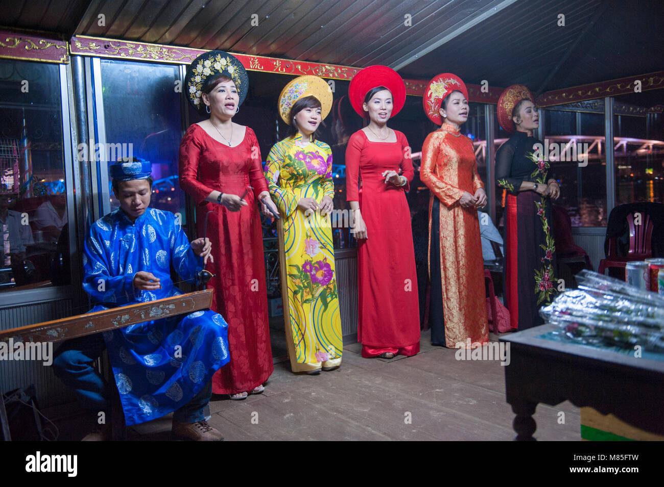 Vietnamese traditional singers on a boat. HUE. VIETNAM Stock Photo - Alamy