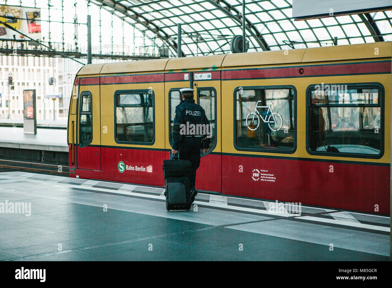 A policeman with the chieftain goes to the train to leave. Demobilization, vacation. Stock Photo