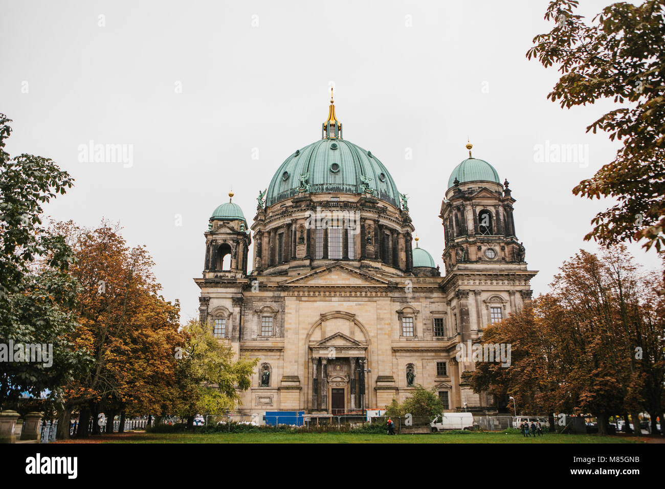 Beautiful old building in the style of neoclassicism and baroque with cross and sculptures Stock Photo