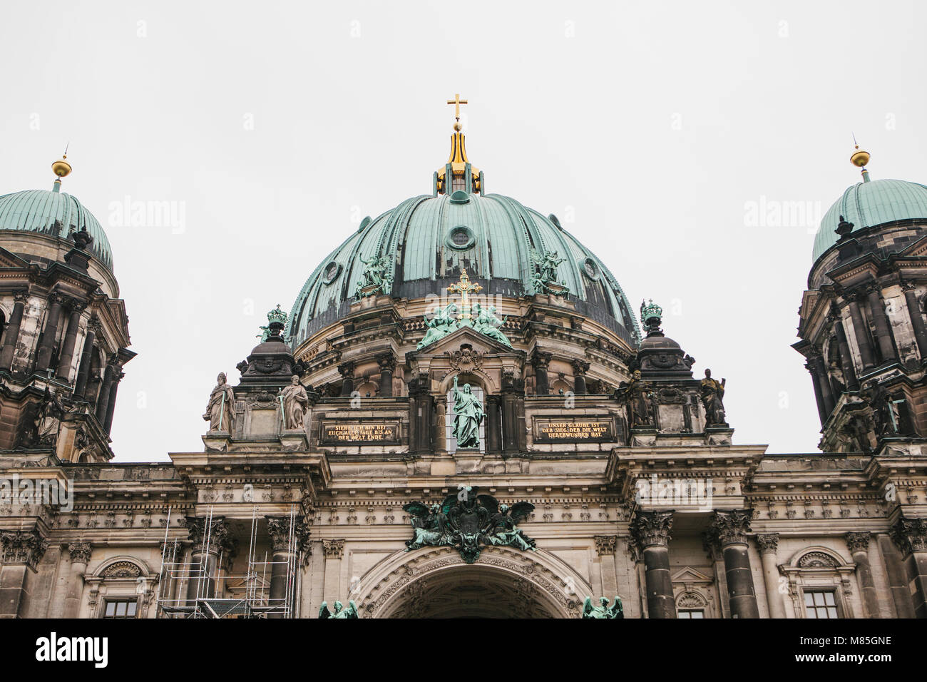 Beautiful old building in the style of neoclassicism and baroque with cross and sculptures Stock Photo