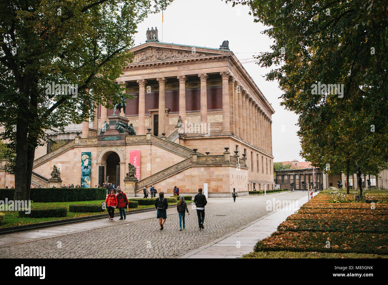 Berlin, October 1, 2017: Beautiful old building of the Berlin national gallery with advertising posters and tourists Stock Photo