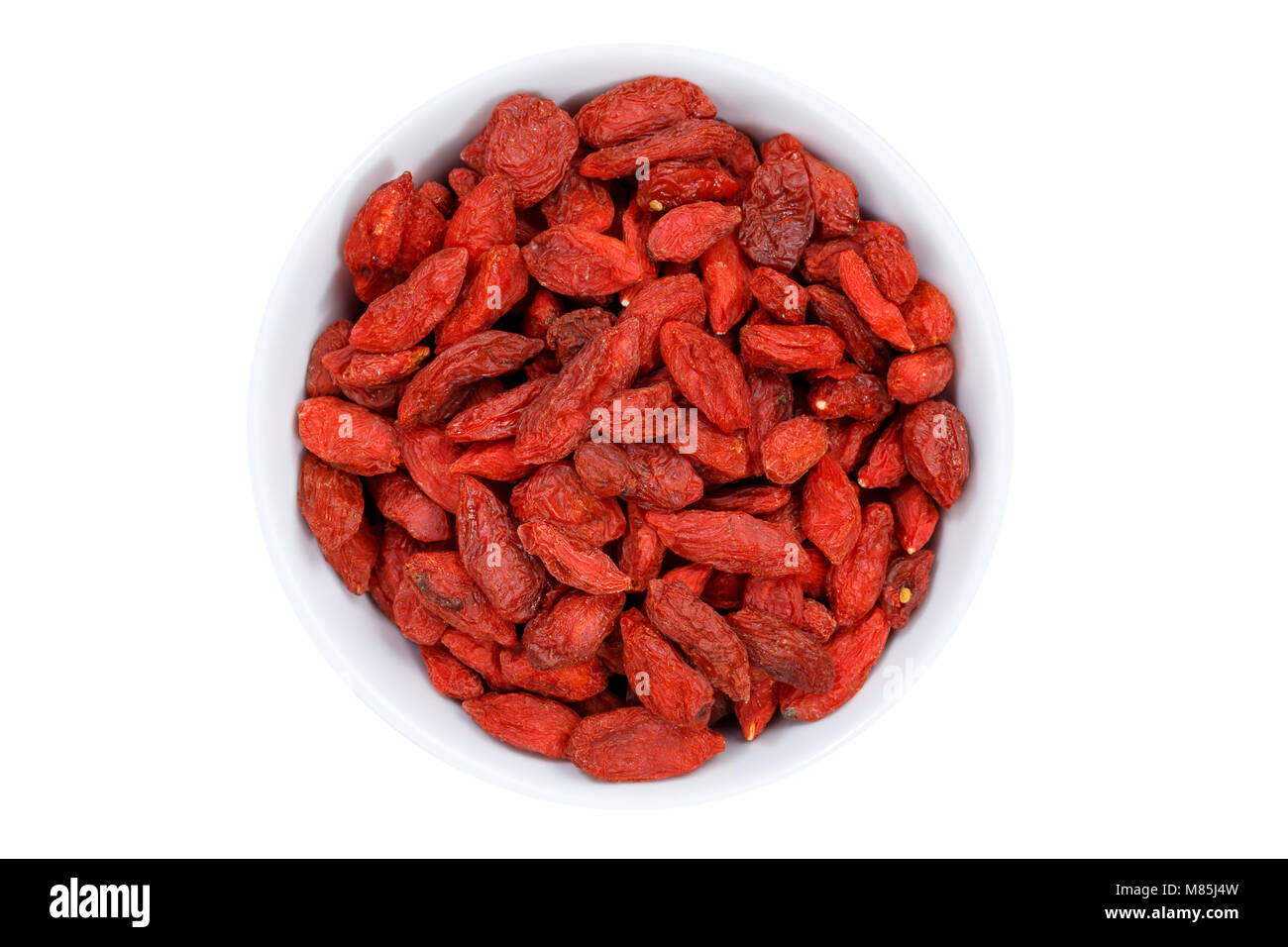 Goji berries berry from above bowl isolated on a white background Stock Photo