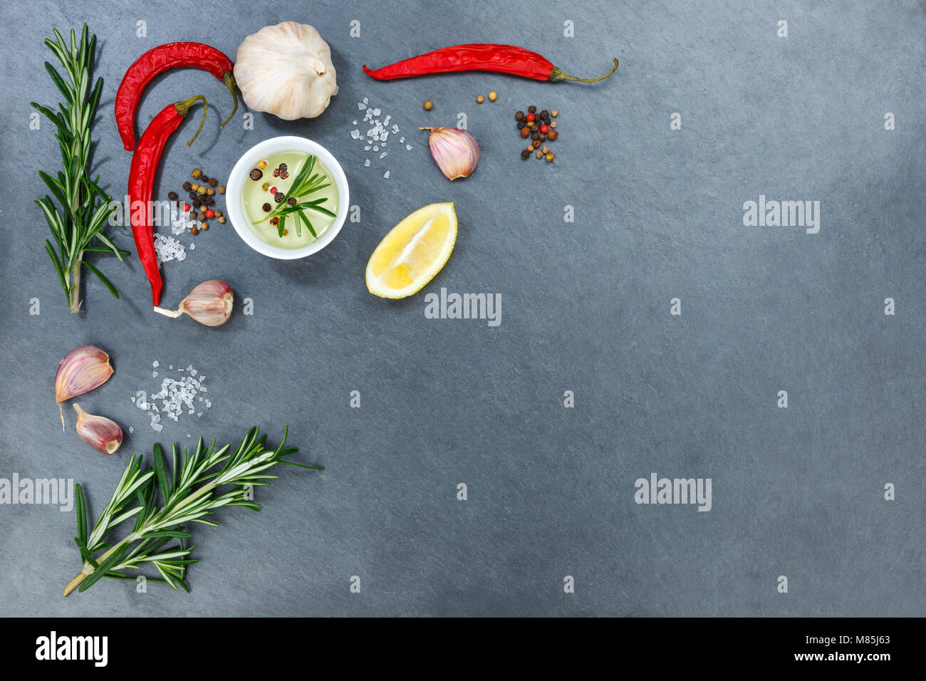Cooking ingredients spices herbs basil copyspace spicy red hot chili peppers chilli spice Stock Photo