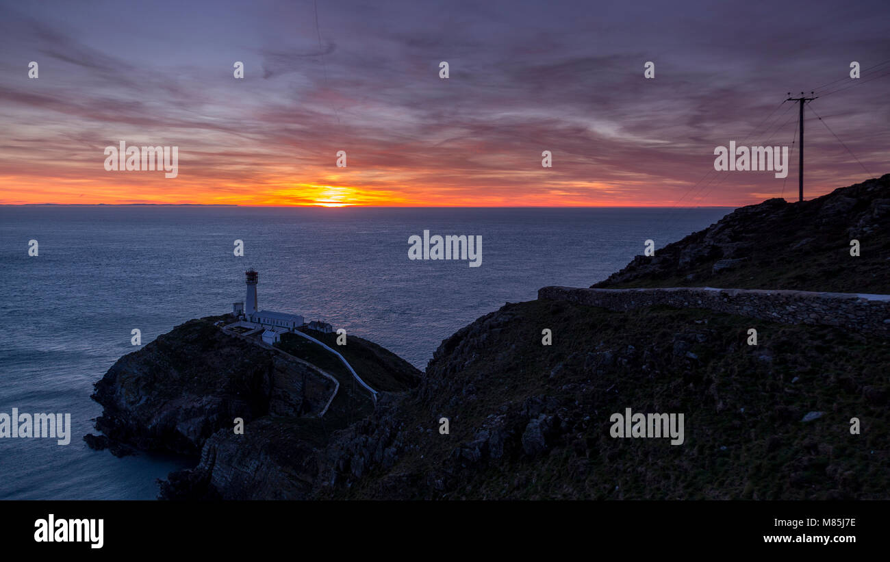 South Stack lighthouse at sunset, Anglesey, Wales Stock Photo