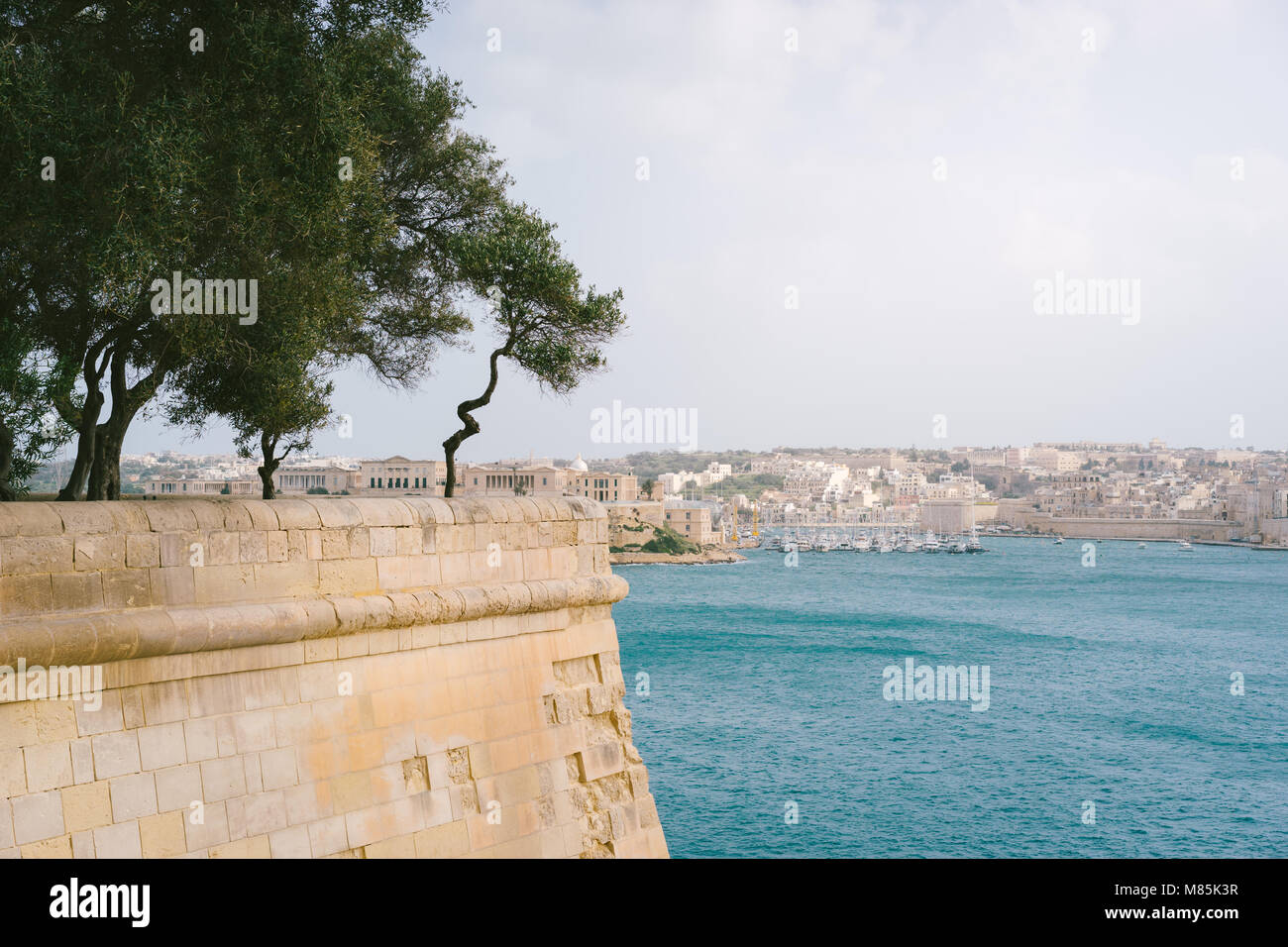 The Grand Harbour view from city walls of Valletta at sunny spring day. Malta Island Stock Photo