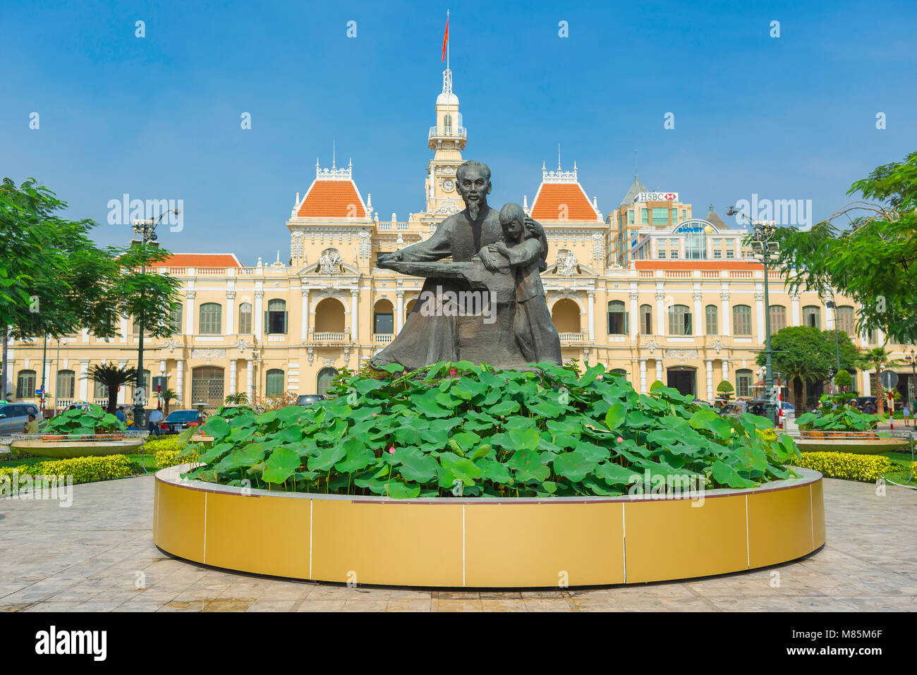Ho Chi Minh City, statue of Ho Chi Minh sited in front of the colonial-era landmark Hotel de Ville in the centre of HCMC, Saigon, Vietnam. Stock Photo