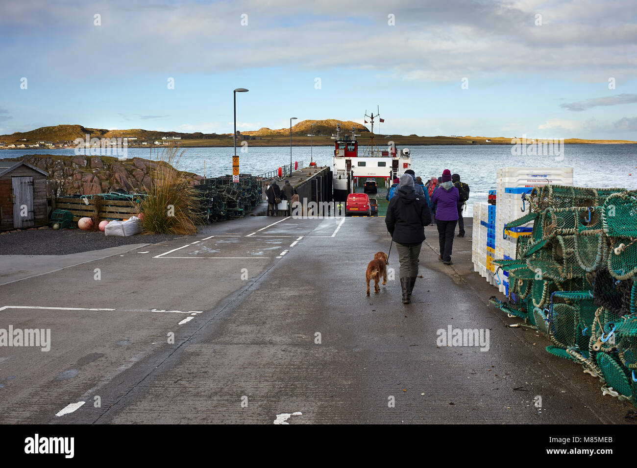 Caledonian MacBrayne ferry terminal. Foot passengers embarking for Iona. Fionnphort, Mull, Scotland. 17th February, 2018. Stock Photo