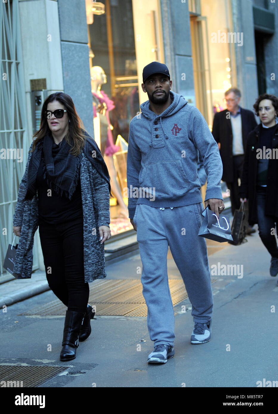 Milan, Maicon in the center of a walk with his wife Maicon Douglas Sisenado, the Brazilian champion known to all simply as MAICON, former defender of the INTER and the national team of Brazil, is now busy with the AVAI team in the carioca championship. Here he is walking in the late afternoon in Via Montenapoleone with his wife. Stock Photo
