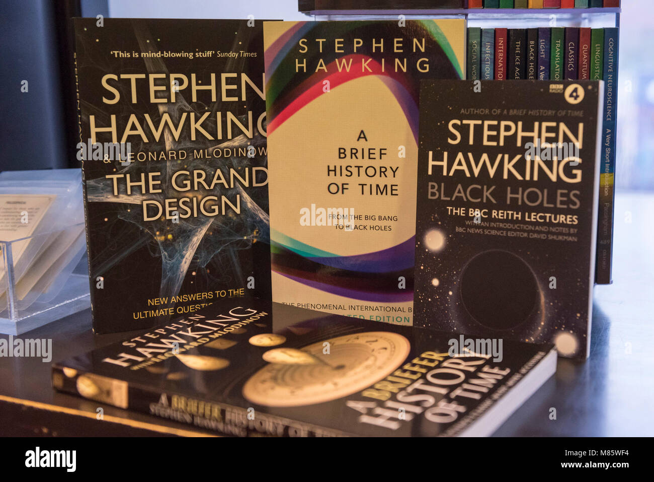 London, Britain. 14th Mar, 2018. World renowned physicist Stephen Hawking's books are seen at a bookshop in London, Britain, on March 14, 2018. Renowned British physicist Stephen Hawking died peacefully at home in the British university city of Cambridge in the early hours of Wednesday at the age of 76, his family spokesman said. Credit: Stephen Chung/Xinhua/Alamy Live News Stock Photo
