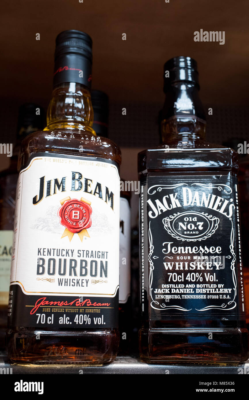 14 March 2018, Hamburg: Two bottles of whiskey brands from the United States are stacked a shelf in a supermarket. The President of the European Jean-Claude Juncker, has announced