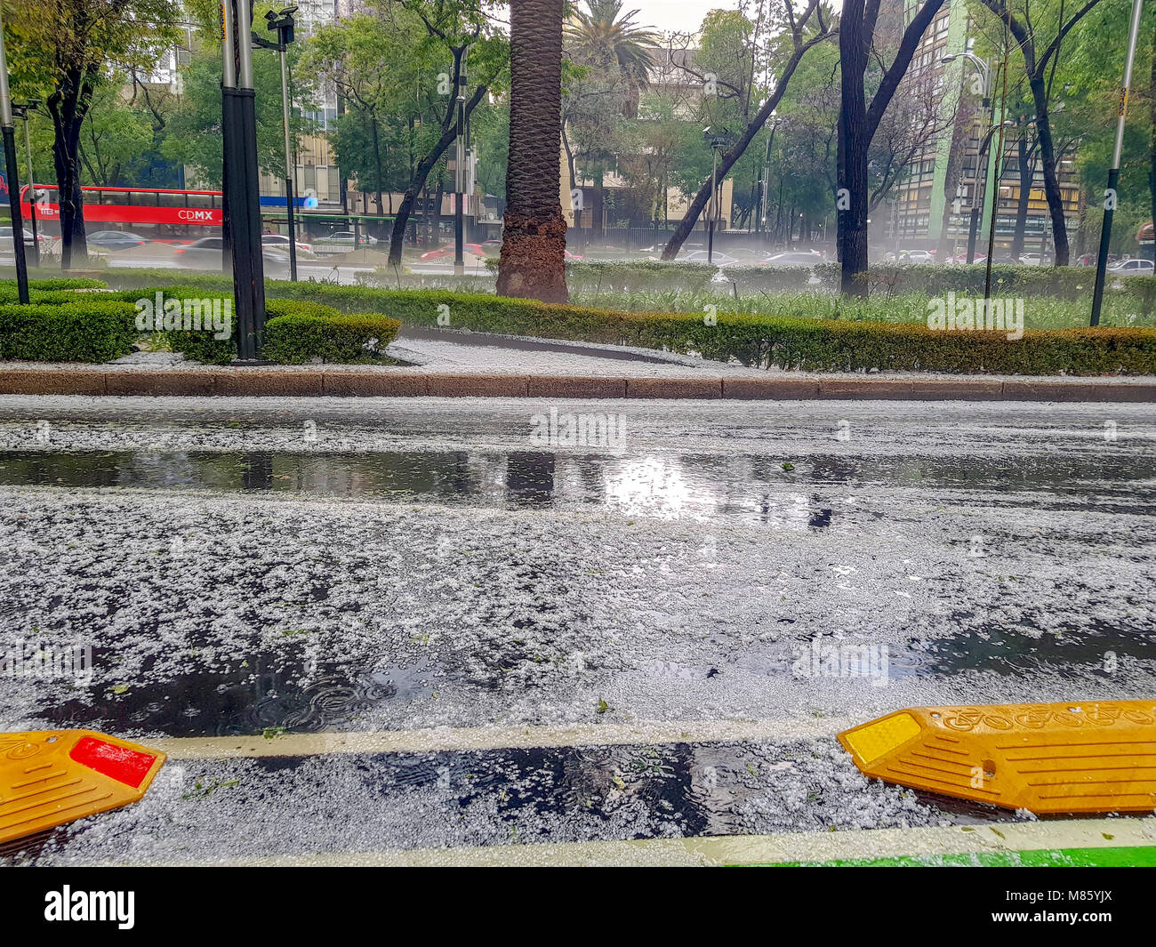 Mexico City, Mexico. 14th Mar, 2018. Shower of hail in Mexico City 14.03.2018,Snow on the streets of Mexico. Hail on the streets of Mexico. Credit: Stanislav Minaychenko/Alamy Live News Stock Photo