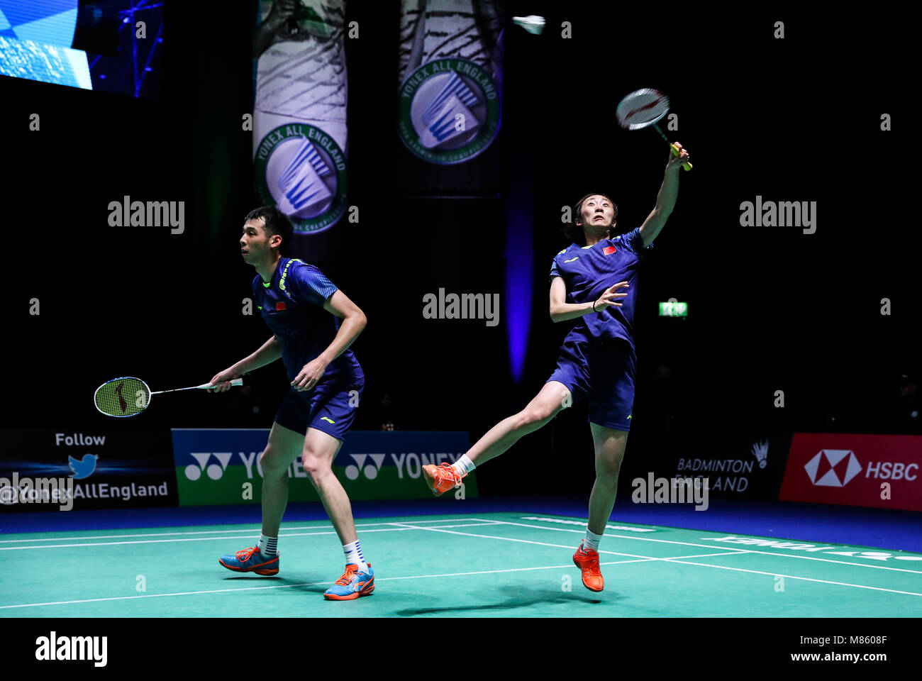 Birmingham, Britain. 14th Mar, 2018. Lu Kai/Cao Tongwei (R) of China compete during the mixed doubles first round match against Lu Ching Yao/Chiang Kai Hsin of Chinese Taipei at All England Open Badminton Championships 2018 in Birmingham, Britain, on March 14, 2018. Lu Kai/Cao Tongwei lost 1-2. Credit: Tang Shi/Xinhua/Alamy Live News Stock Photo