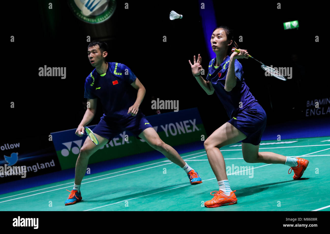 Birmingham, Britain. 14th Mar, 2018. Lu Kai/Cao Tongwei (R) of China compete during the mixed doubles first round match against Lu Ching Yao/Chiang Kai Hsin of Chinese Taipei at All England Open Badminton Championships 2018 in Birmingham, Britain, on March 14, 2018. Lu Kai/Cao Tongwei lost 1-2. Credit: Tang Shi/Xinhua/Alamy Live News Stock Photo