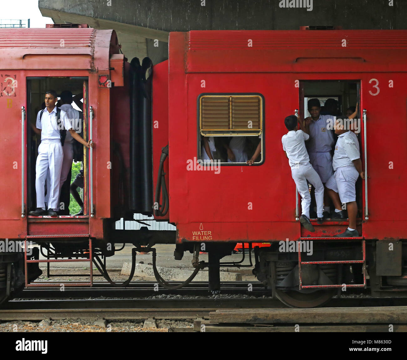 The School Childern Traveling on train footboard after School From