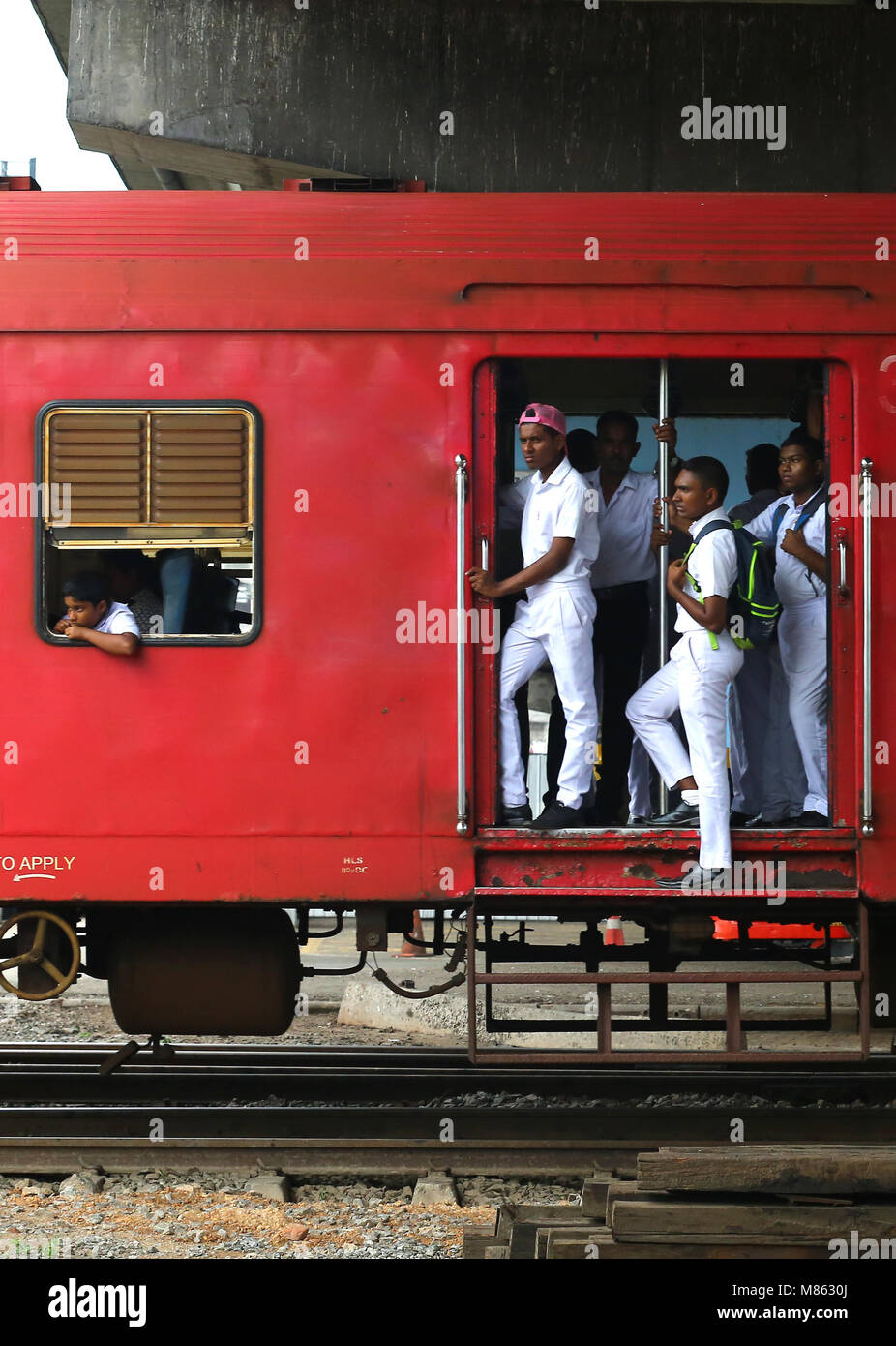 The School Childern Traveling on train footboard after School From