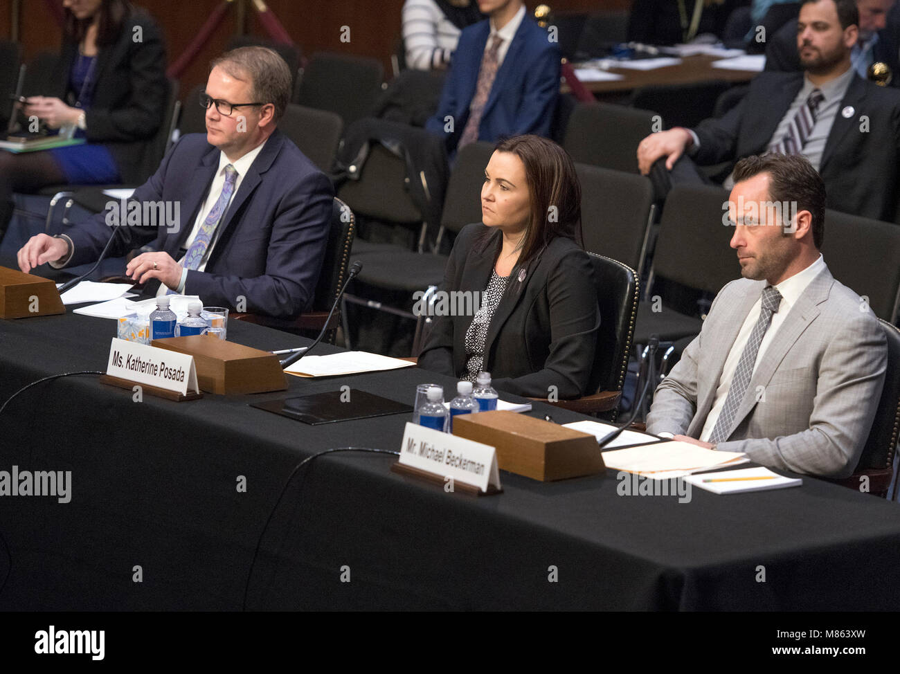 Ryan B. Petty, who's 14 year-old daughter Alaina JoAnn Petty was one of the seventeen people killed at Marjory Stoneman Douglas High School on February 14, 2018, left, Katherine Posada, a 10th-grade English teacher at Marjory Stoneman Douglas High School, center, and Michael Beckerman, President and CEO of the Internet Association, right, testify before the United States Senate Committee on the Judiciary during 'an oversight hearing to examine the Parkland shooting and legislative proposals to improve school safety' on Capitol Hill in Washington, DC on Wednesday, March 14, 2018. Credit: Ron Sa Stock Photo