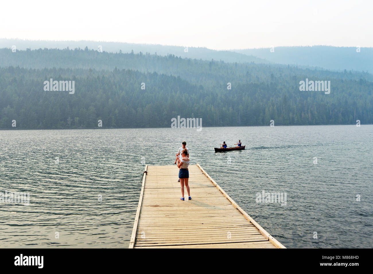 Tourists at Clearwater, Gray Wells Provincial Park. Wildfire smoke haze all around Stock Photo