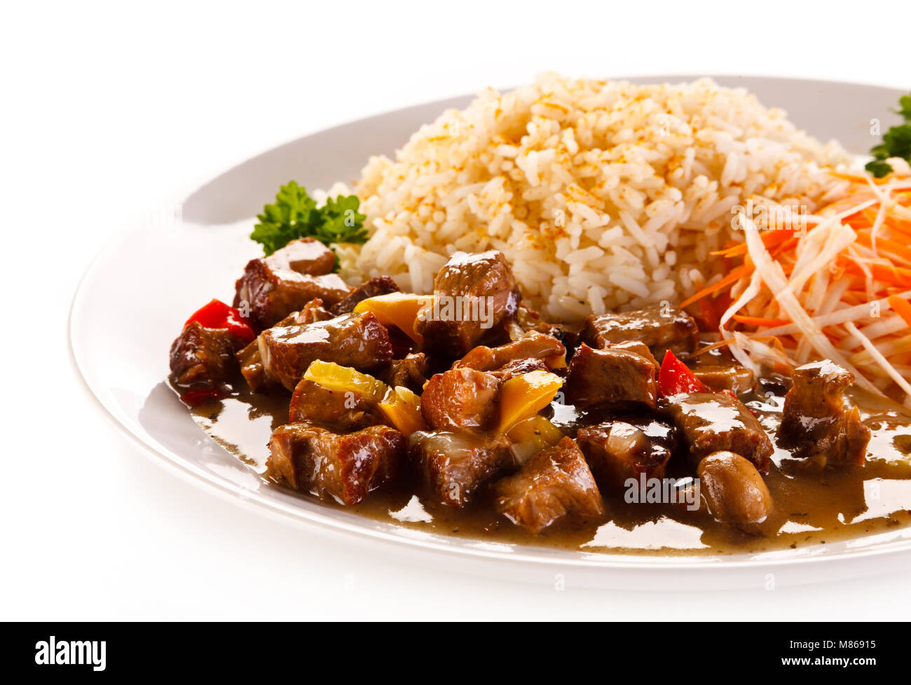 Roasted meat, white rice and vegetables Stock Photo