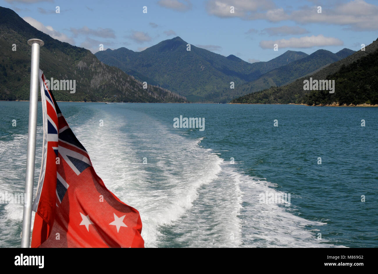 The Pelorus Mailboat, oficially part of the NewZealand Post mail run, takes mail, supplies and passengers to remote parts of the Marlborough Sound. Stock Photo