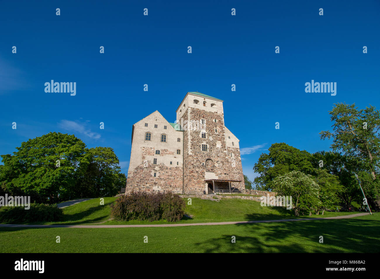 Turku Castle in the city of Turku in Finland.   Turku Castle is a medieval building founded in the late 13th century. Stock Photo