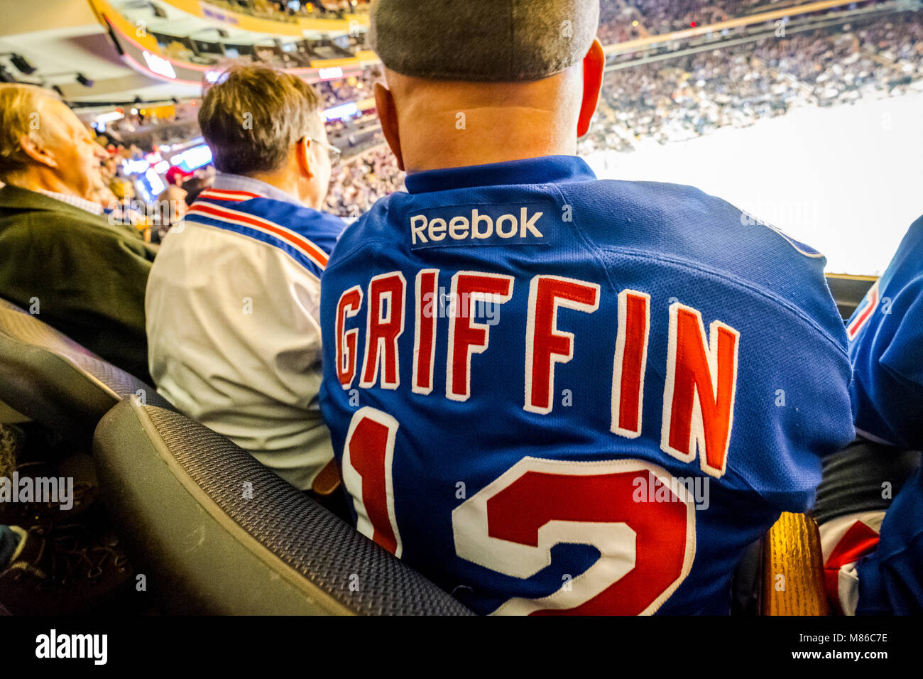 Spectators watching ice hockey game at Madison Square Garden, Manhattan