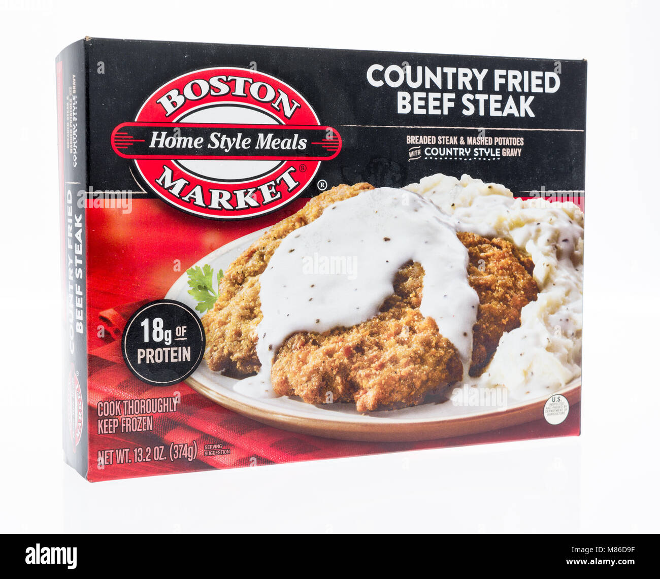 Winneconne, WI - 27 February 2018:   A box of Boston Market home style meals in country fried beef steak on an isolated background. Stock Photo