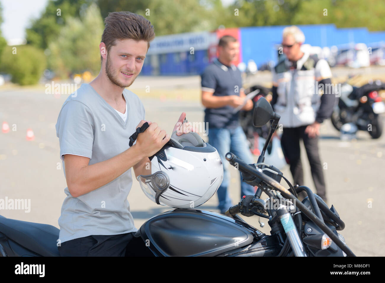 young confident boy doing a test motorbike Stock Photo
