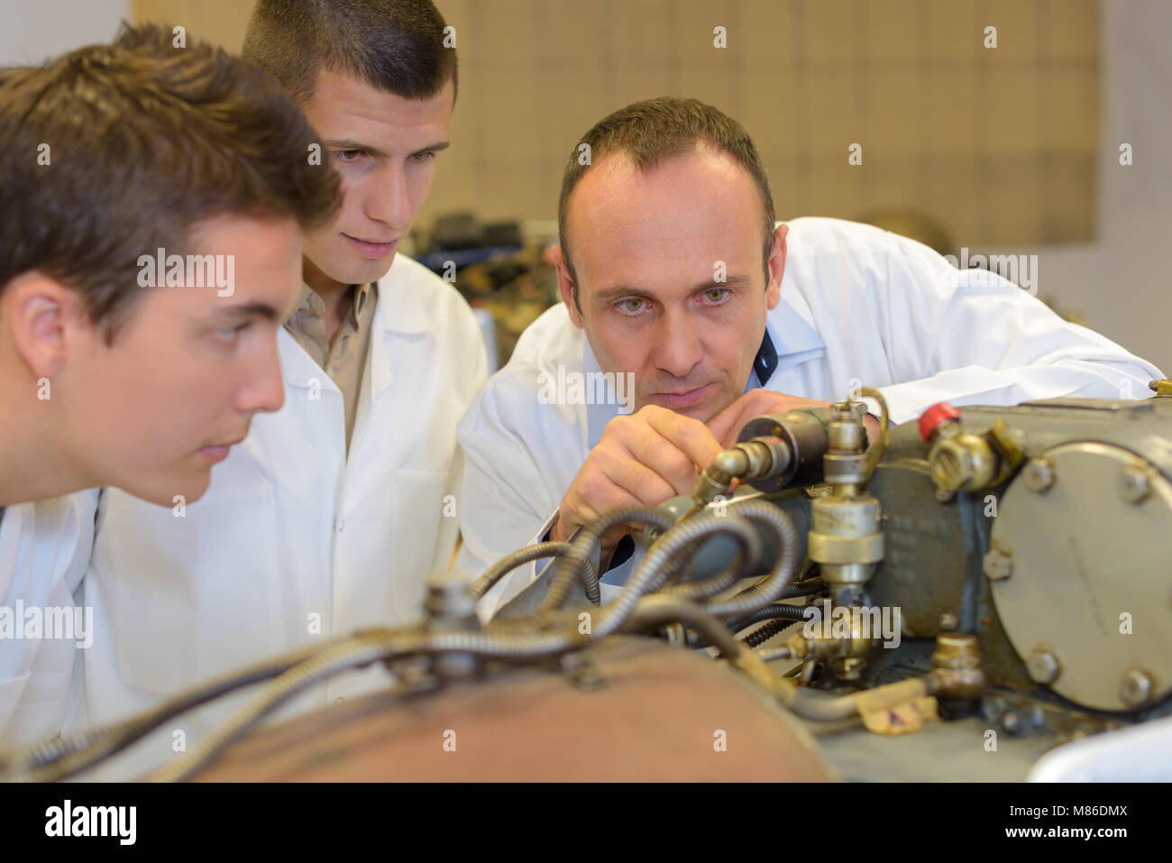 Two Guys Inventing Machine Invention of motorized machinery hi-res stock photography and images ...