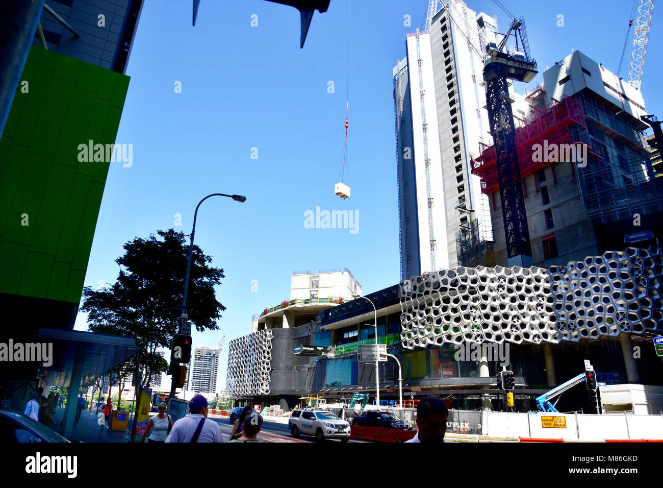 WORKING ON NEW HIGH RISE BUILDING IN BRISBANE CITY AUSTRALIA Stock