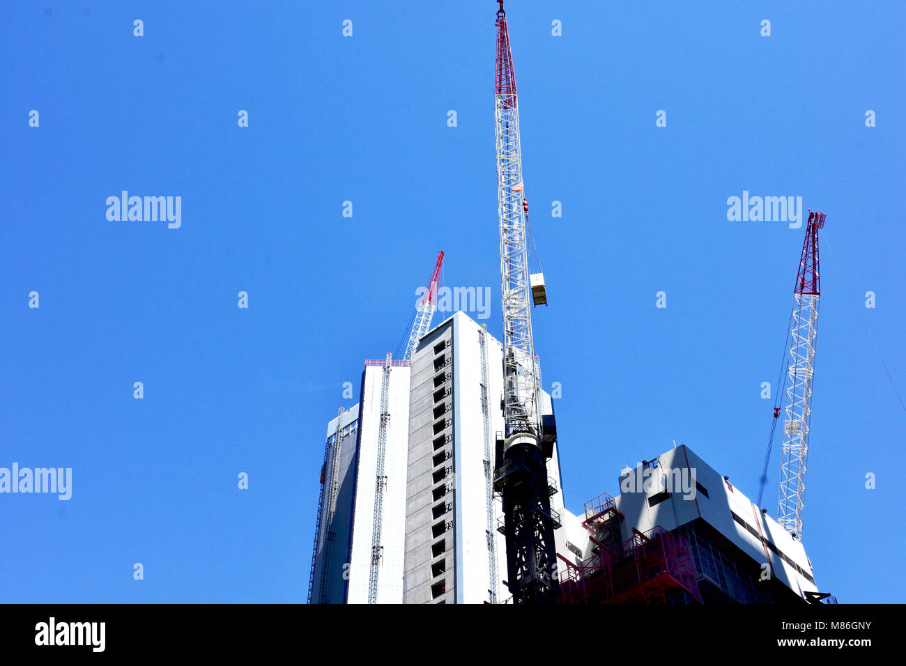 WORKING ON NEW HIGH RISE BUILDING IN BRISBANE CITY AUSTRALIA Stock